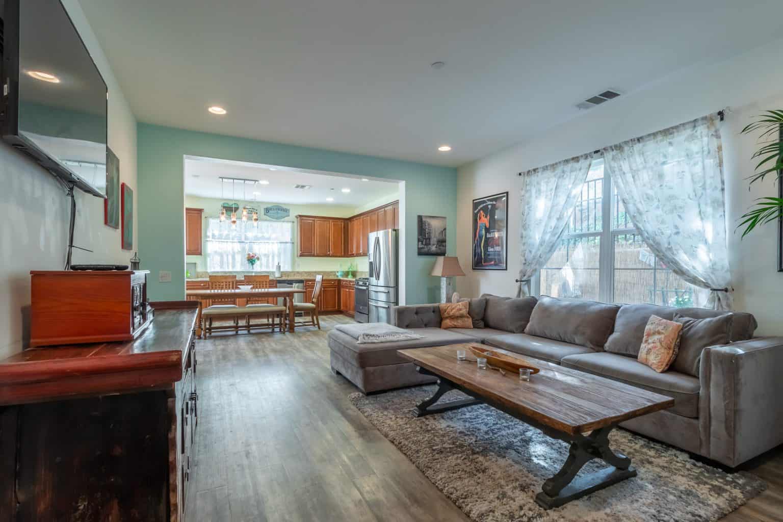 A living room with sofas and a table