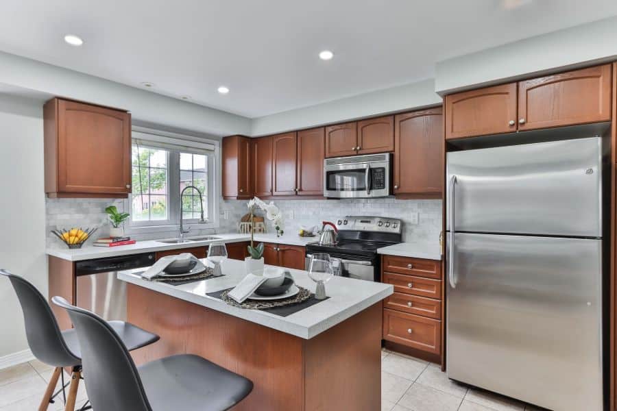 Kitchen with dark brown wooden cabients