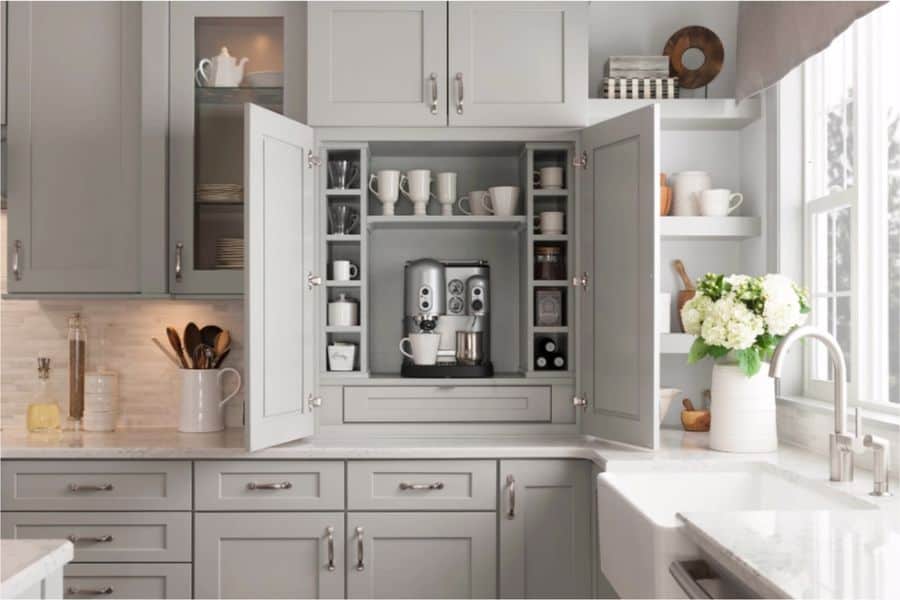 Unlocked kitchen cabinet displaying its contents