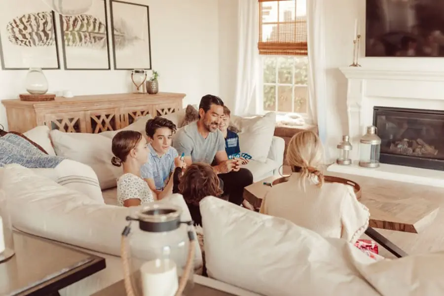 Family playing a card game