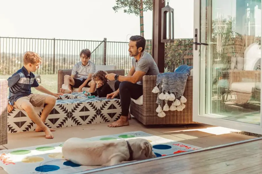 Family enjoying their Arhaus Furniture set outdoors