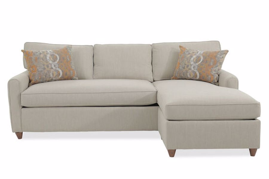 Brown sofa with throw pillows