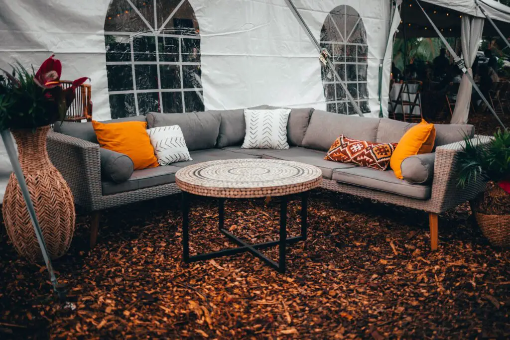 Outdoor sofa and round table