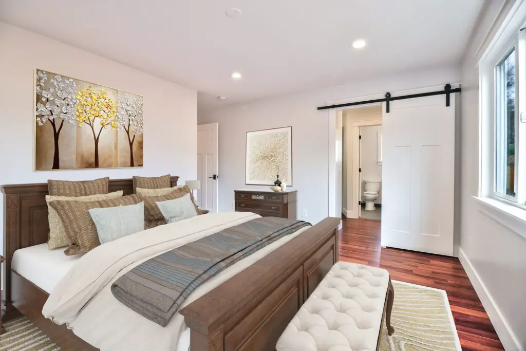 a white and black color toned bedroom