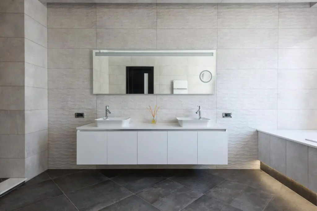 Vanity bathroom with a tub and cabinets