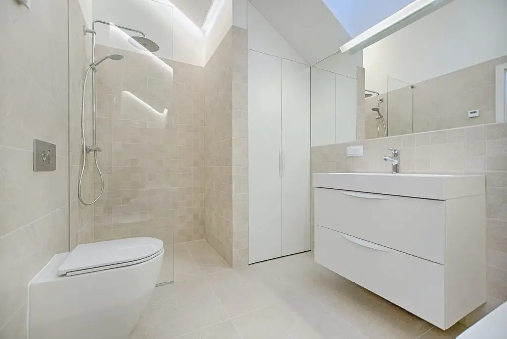 Bathroom with cabinets and a mirror