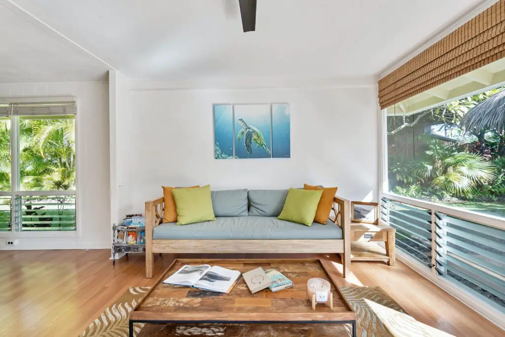 Living room with wooden furniture and outdoor view