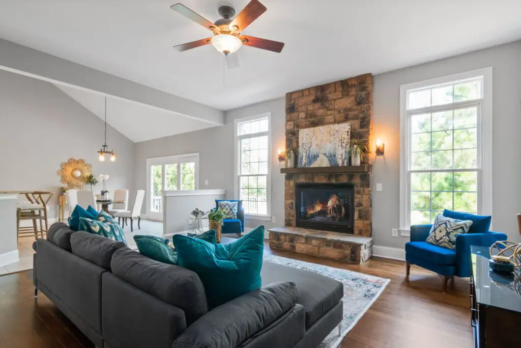 Living room with gray sofa and blue chair