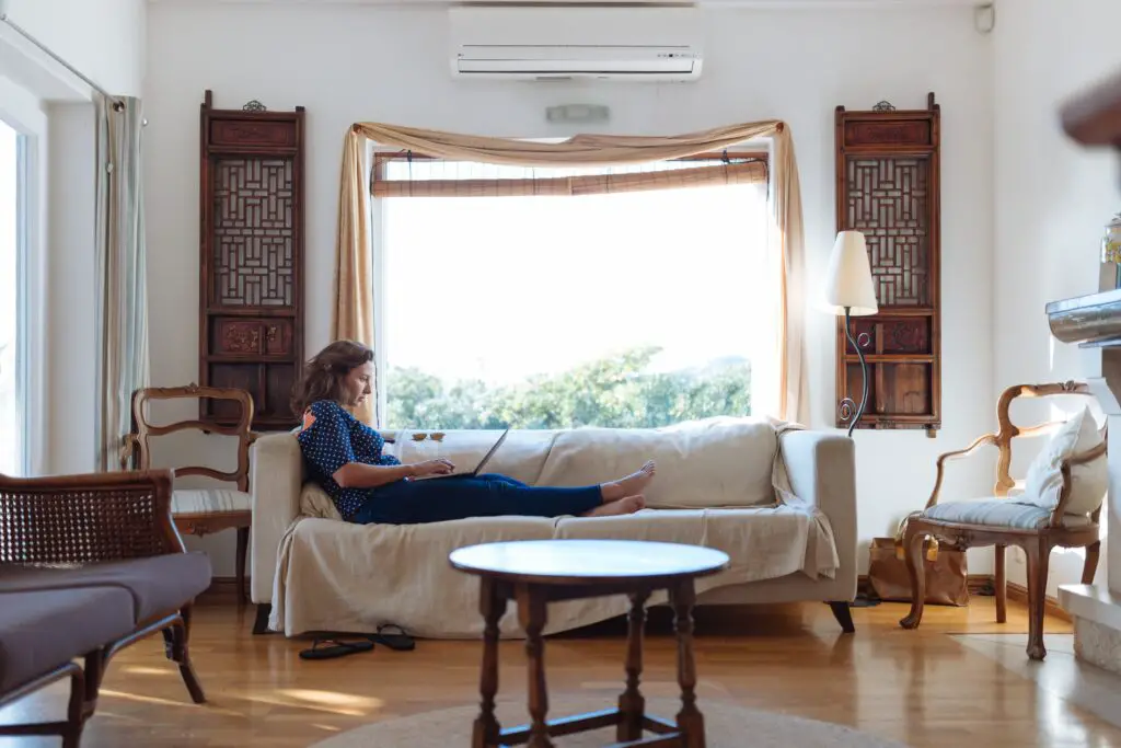 A woman sitting on a sofa 