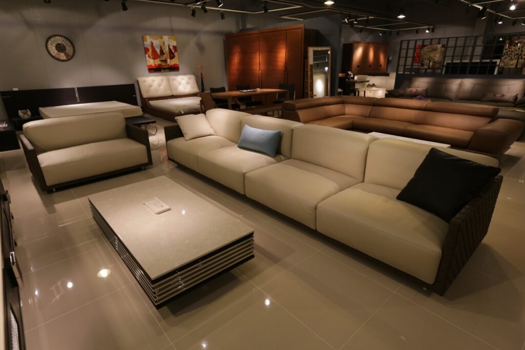 Living room furniture with white cushions and a table
