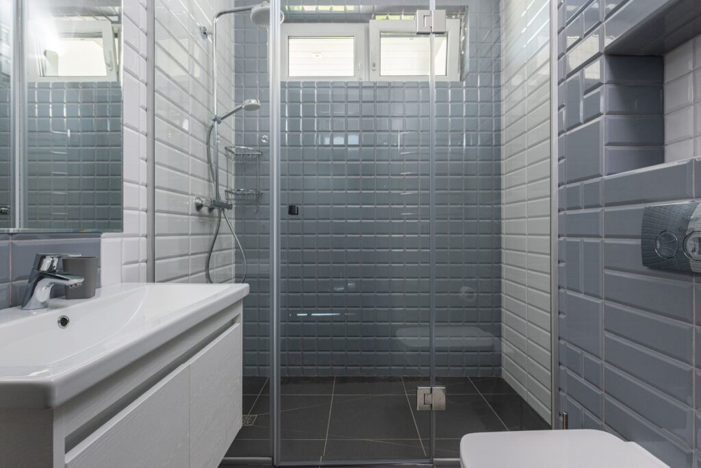 A bathroom with wall tiles
