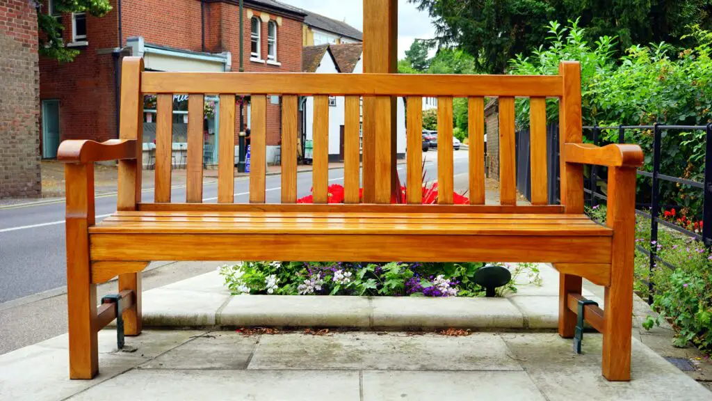 A shiny wooden bench