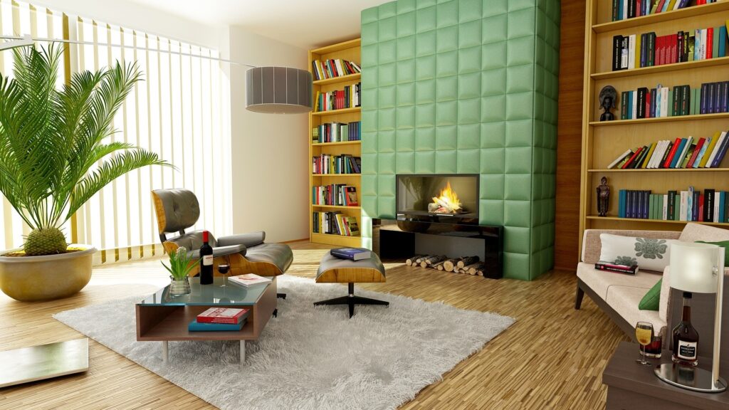 A living room filled with books and colored walls with a recliner and a fireplace
