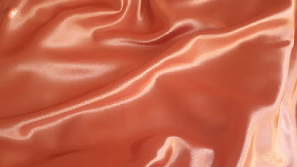A smooth shiny polyester textile