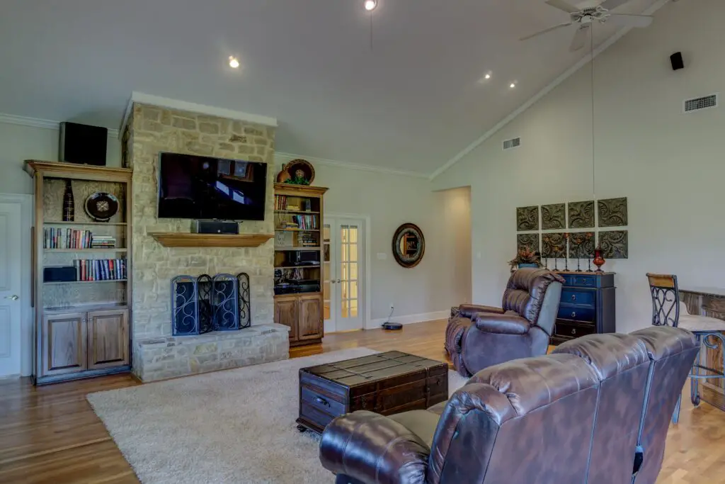 A recliner couch and recliner chair in a living room