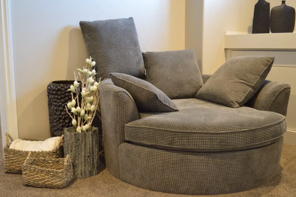 An accent chair with pillows