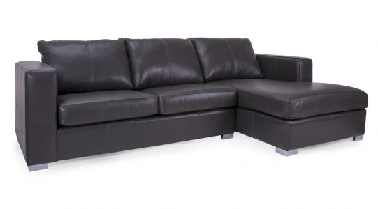 A black sectional leather sofa placed on a white surface