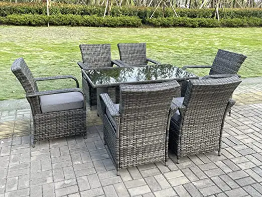 A six rectangular rattan Fimous garden dining set placed outside