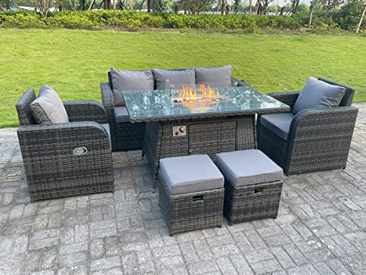 A gray and black Fimous Rattan garden furniture set with outdoor gas fire pit and footstool