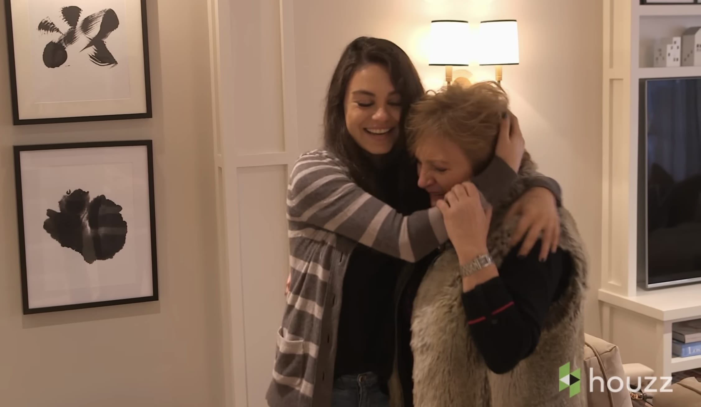 Mila Kunish hugging her mom after surprising her with a home renovation.